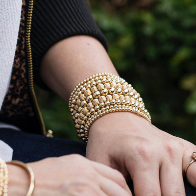 ENewton Extends Dignity Gold Bracelet