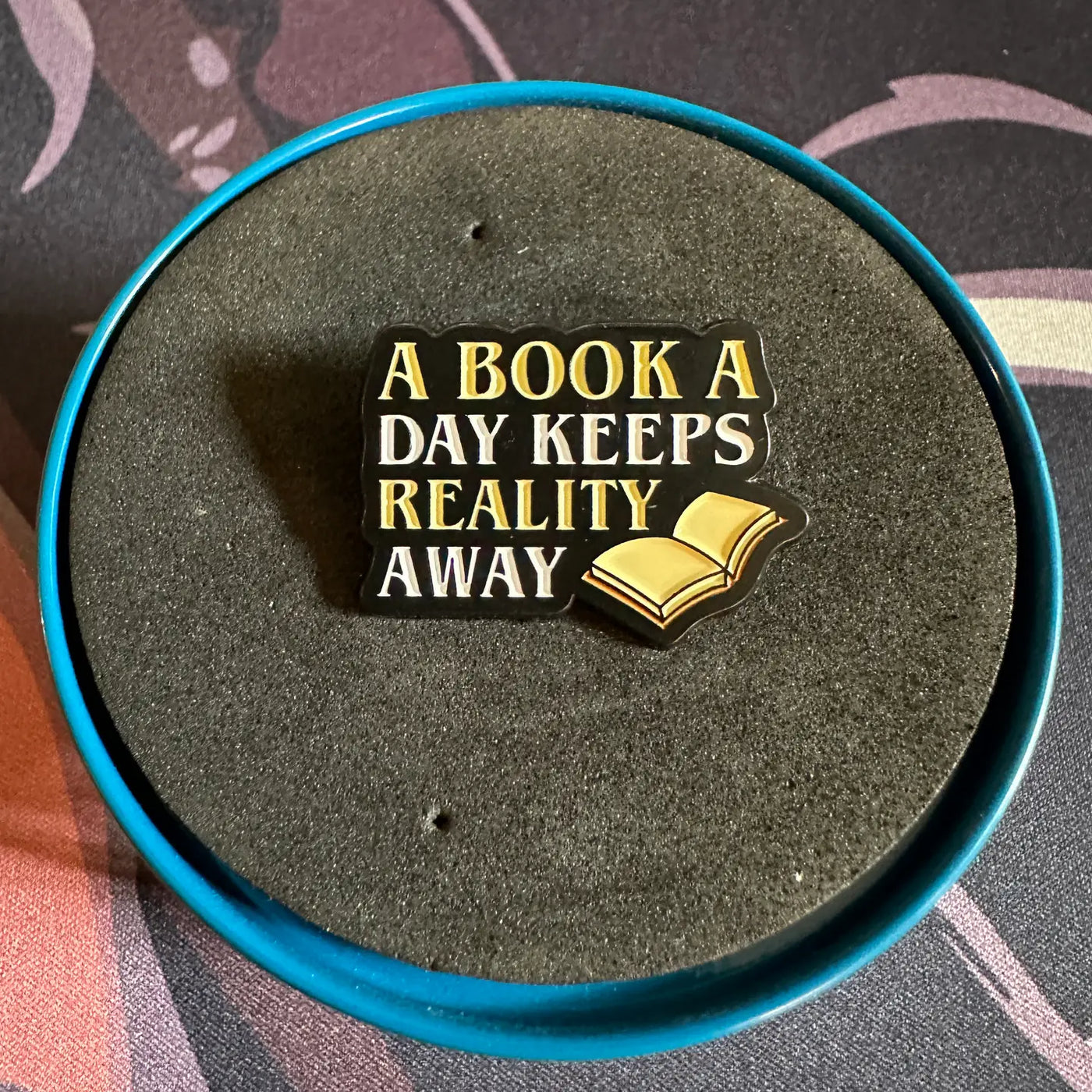 "A Book A Day Keeps Reality Away" Pin