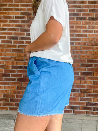 The Washed Denim Frayed Hem Shorts