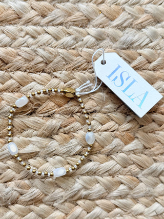Isla “Here, There, & Everywhere” – White Cap Stretch Bracelet