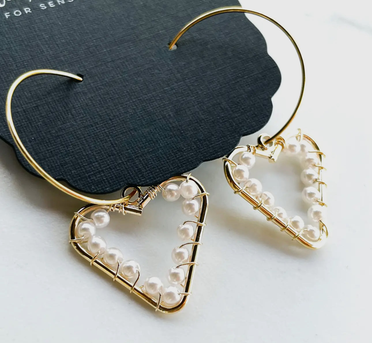 Pearl affection heart earrings