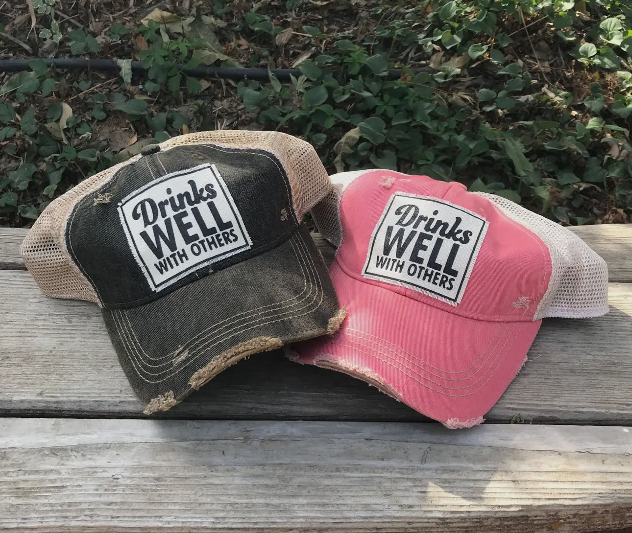 Drinks well with others Distressed Trucker Cap