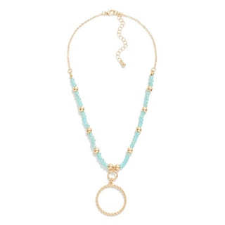 Short Beaded Necklace Featuring Twisted Metal Circle Pendant