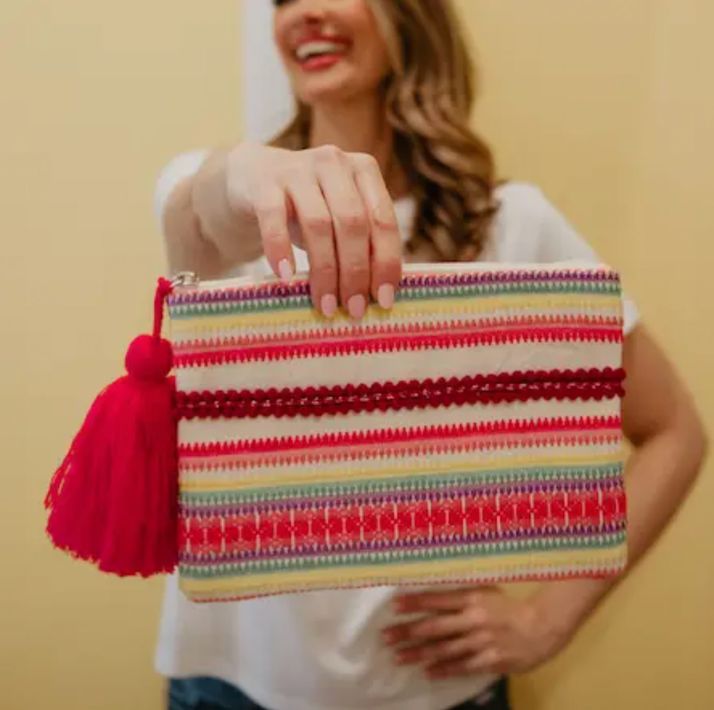 Striped Multicolored Clutch with Pink Tassel