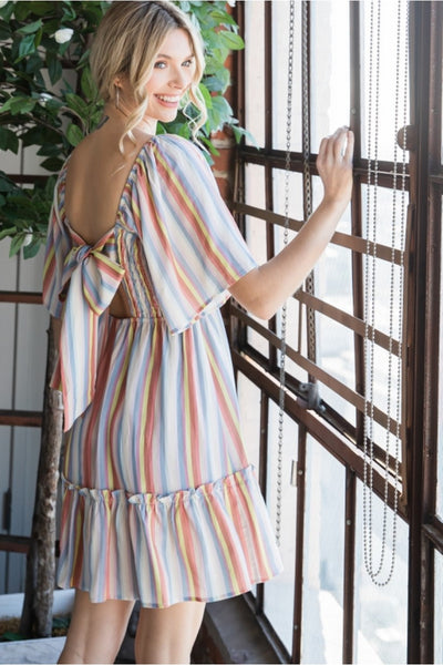 Striped baby doll dress with a smocked bodice with wide half sleeves