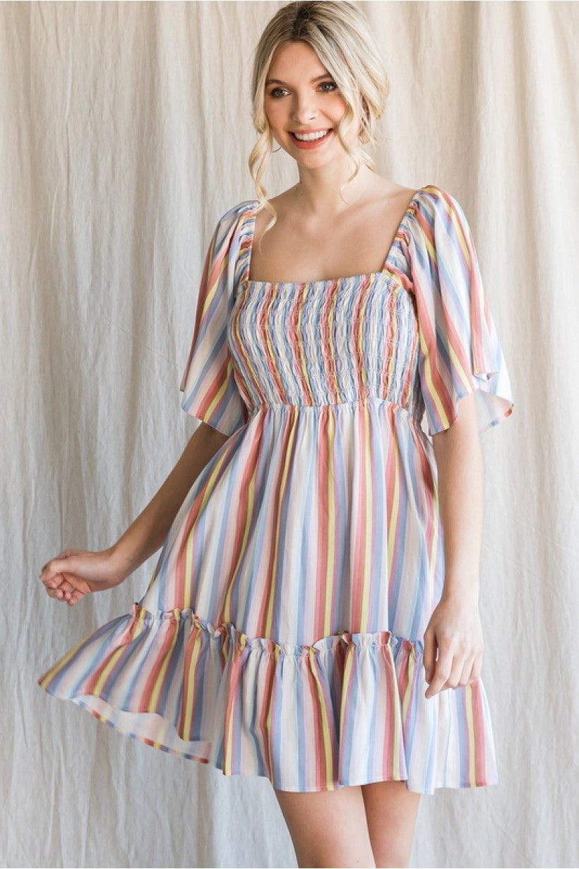Striped baby doll dress with a smocked bodice with wide half sleeves